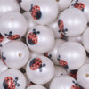 close up view of a pile of 20mm Ladybug print on Matte White Acrylic Bubblegum Beads