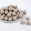 Front view of a pile of 20MM Latte Brown AB Solid Chunky Bubblegum Beads