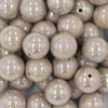 Close up view of a pile of 20MM Latte Brown AB Solid Chunky Bubblegum Beads