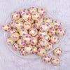top view of a pile of 20mm Lemon Fruit print on Matte White Acrylic Bubblegum Beads