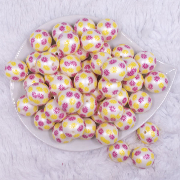 top view of a pile of 20mm Lemon Fruit print on Matte White Acrylic Bubblegum Beads