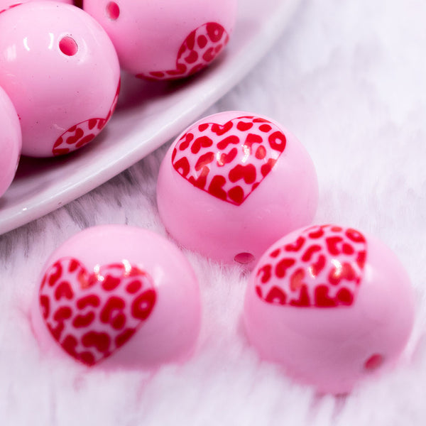 Macro view of a pile of 20mm Pink with Red Leopard Print Heart Chunky Acrylic Bubblegum Beads [10 Count]
