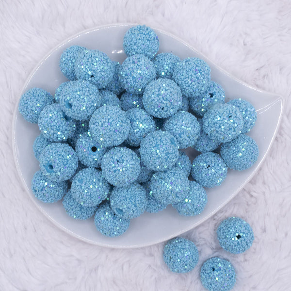 top view of a pile of 20mm Light Blue Sequin Confetti Bubblegum Beads