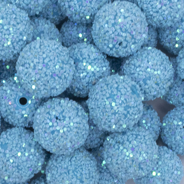 closeup view of a pile of 20mm Light Blue Sequin Confetti Bubblegum Beads