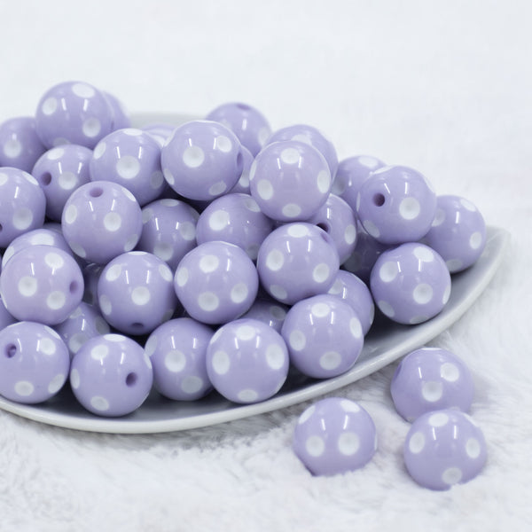 Front view of a pile of 20mm Light Purple with White Polka Dots Acrylic Bubblegum Beads