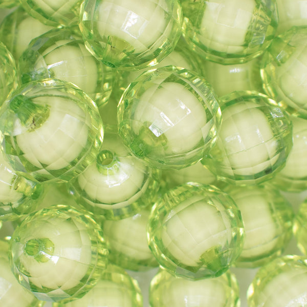 close up view of a pile of 20mm Lime Green Translucent Faceted Bead in a bead Bubblegum Bead