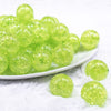 front view of a pile of 20mm Lime Green Crackle AB Bubblegum Beads