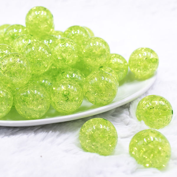 front view of a pile of 20mm Lime Green Crackle AB Bubblegum Beads