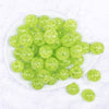 top view of a pile of 20mm Lime Green Crackle AB Bubblegum Beads