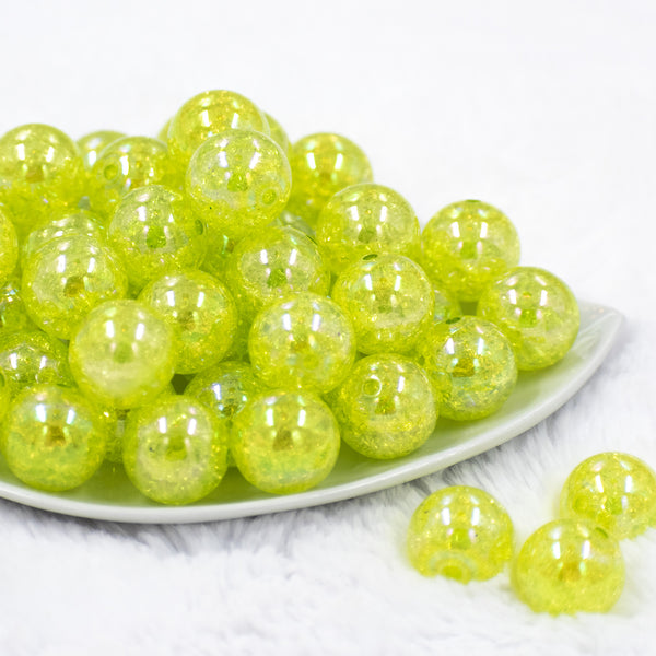 Front view of a pile of 20mm Lime Green Crackle AB Bubblegum Beads