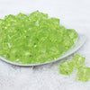 Front view of a pile of 20mm Lime Green Transparent Cube Faceted Pearl Bubblegum Beads