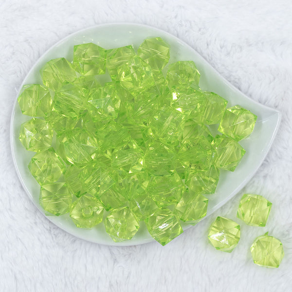 Top view of a pile of 20mm Lime Green Transparent Cube Faceted Pearl Bubblegum Beads