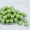 Front view of a pile of 20mm Lime Green Pearl Pumpkin Shaped Bubblegum Bead