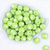 Top view of a pile of 20mm Lime Green with White Stars Bubblegum Beads