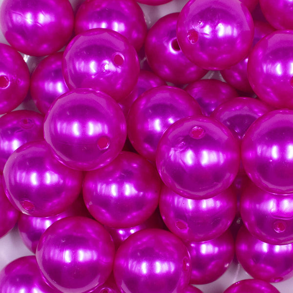 Close up view of a pile of 20mm Magenta Pink Faux Pearl Bubblegum Beads