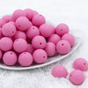 Front view of a pile of 20mm Bubblegum Pink Matte Solid Bubblegum Beads