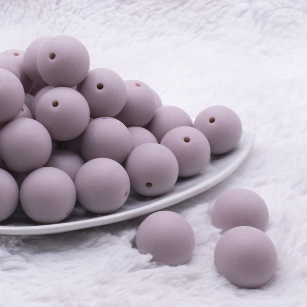 front view of a pile of 20mm Mauve Pink Matte Solid Chunky Bubblegum Beads