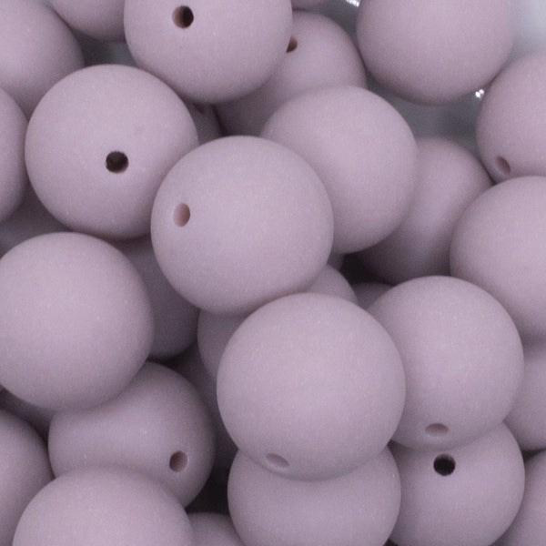 close up view of a pile of 20mm Mauve Pink Matte Solid Chunky Bubblegum Beads