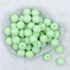 Top view of a pile of 20mm Mint Green Matte Solid Bubblegum Beads