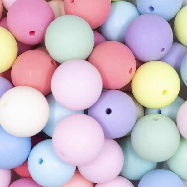 Close up view of a pile of 20mm Matte Pastel Solid Color Mix Acrylic Bubblegum Beads Bulk [Choose Count]