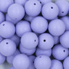 Close up view of a pile of 20mm Periwinkle Purple Matte Solid Bubblegum Beads