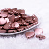 Front view of a pile of 20mm Rose Matte Rubberized Style Heart Beads