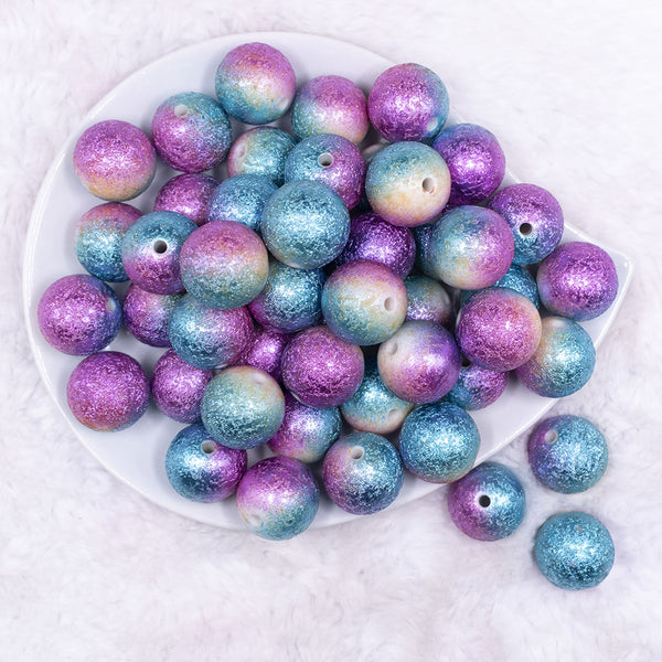 top view of a pile of 20mm Mermaid Stardust Ombre Shimmer Bubblegum Beads