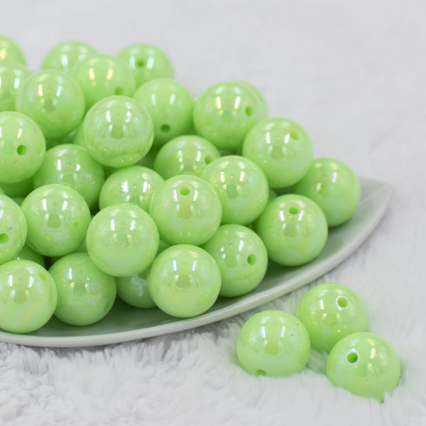 Front view of a pile of 20mm Mint Green Solid AB Bubblegum Beads