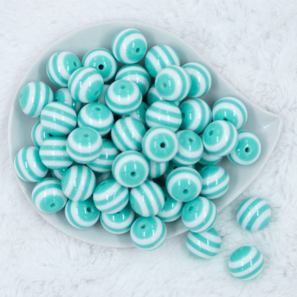 Top view of a pile of 20mm Mint Green with White Stripes Bubblegum Beads