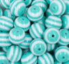 Close up view of a pile of 20mm Mint Green with White Stripes Bubblegum Beads