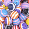 close up view of a pile of 20mm Mixed Specialty Stripes Resin Chunky Bubblegum Jewelry Beads