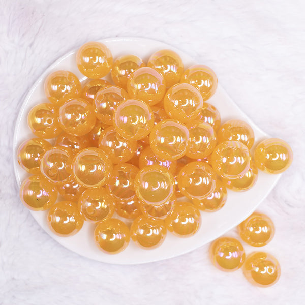 top view of a pile of 20mm Mustard Orange Jelly AB Acrylic Chunky Bubblegum Beads