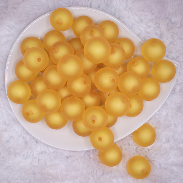 top view of a pile of 20mm Mustard Yellow Frosted Bubblegum Beads