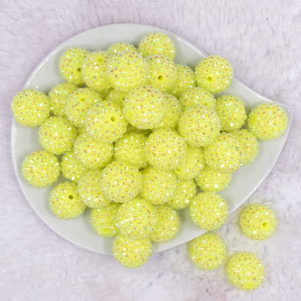 Top view of a pile of 20mm Neon Yellow Rhinestone AB Bubblegum Beads
