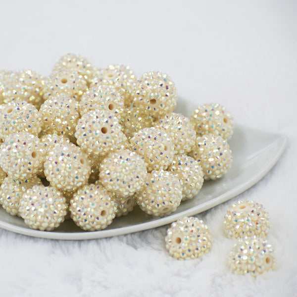Front view of a pile of 20mm Cream Rhinestone AB Bubblegum Beads