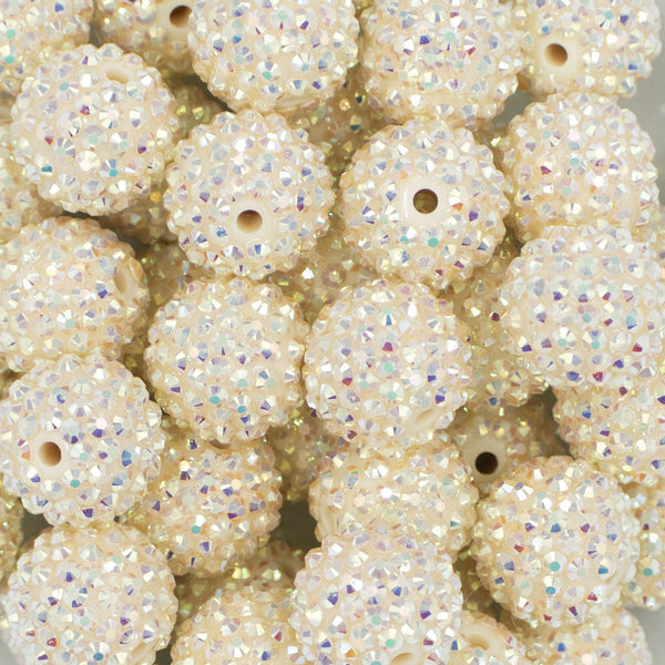Close up view of a pile of 20mm Cream Rhinestone AB Bubblegum Beads