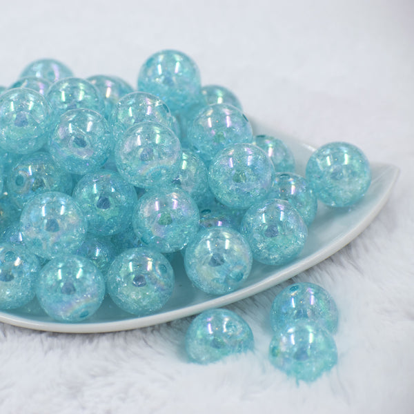 Front view of a pile of 20mm Pastel Blue Crackle AB Bubblegum Beads
