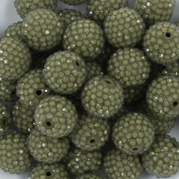 Close up view of a pile of 20mm Army Green with Clear Rhinestone Bubblegum Beads