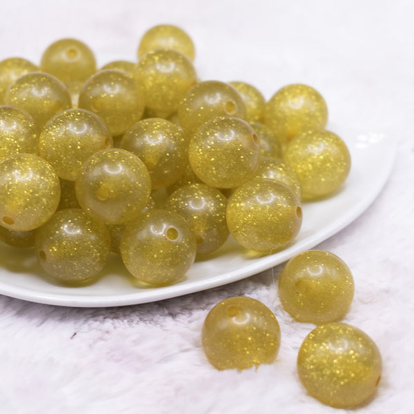 front view of a  pile of 20mm Olive Yellow Glitter Sparkle Chunky Acrylic Bubblegum Beads