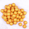 Top view of a pile of 20mm Orange Leopard Animal Print Acrylic Bubblegum Beads