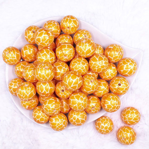 Top view of a pile of 20mm Orange Leopard Animal Print Acrylic Bubblegum Beads