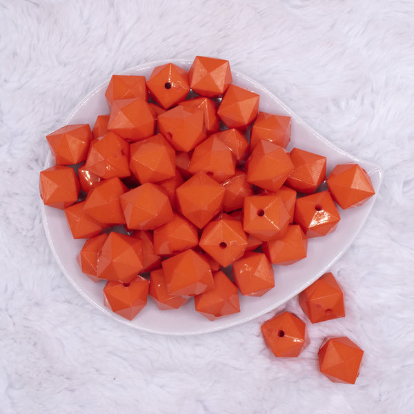 top view of a pile of 20mm Orange Cube Faceted Bubblegum Beads