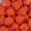 close up view of a pile of 20mm Orange Cube Faceted Bubblegum Beads