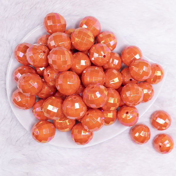 top view of a pile of 20mm Orange Disco Faceted AB Bubblegum Beads