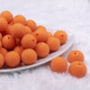 Front view of a pile of 20mm Orange Sugar Glass Bubblegum Beads