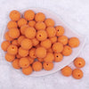 Top view of a pile of 20mm Orange Sugar Glass Bubblegum Beads