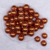 Top view of a pile of 20mm Orange with Glitter Faux Pearl Bubblegum Beads