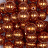 Close up view of a pile of 20mm Orange with Glitter Faux Pearl Bubblegum Beads