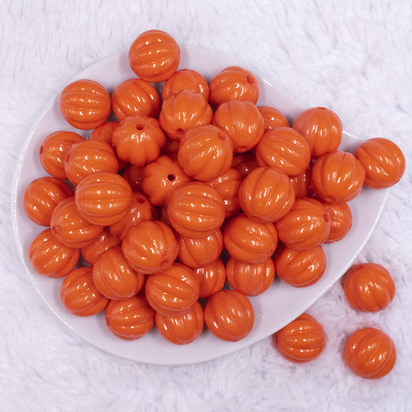 top view of a pile of 20mm Orange Opaque Pumpkin Shaped Bubblegum Bead