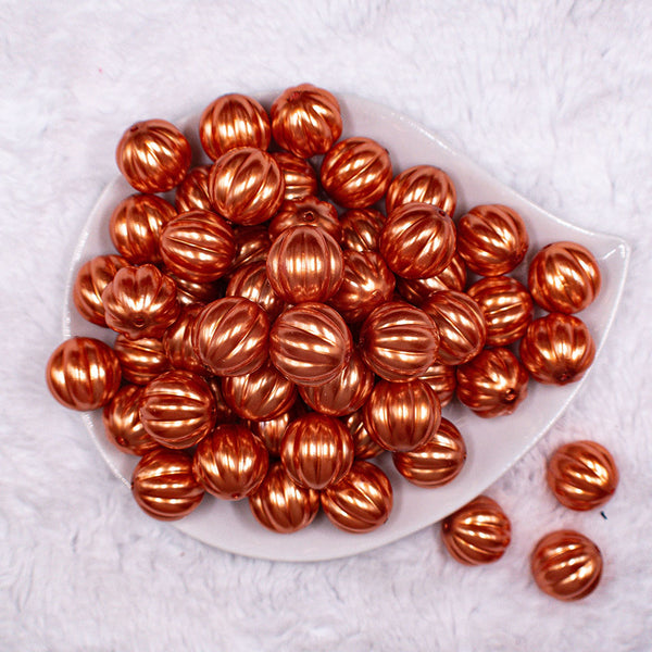 Top view of a pile of 20mm Orange Pearl Pumpkin Shaped Bubblegum Bead